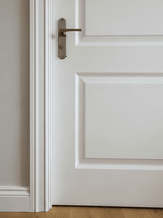 Professional door installation service showing perfectly fitted interior doors with security features