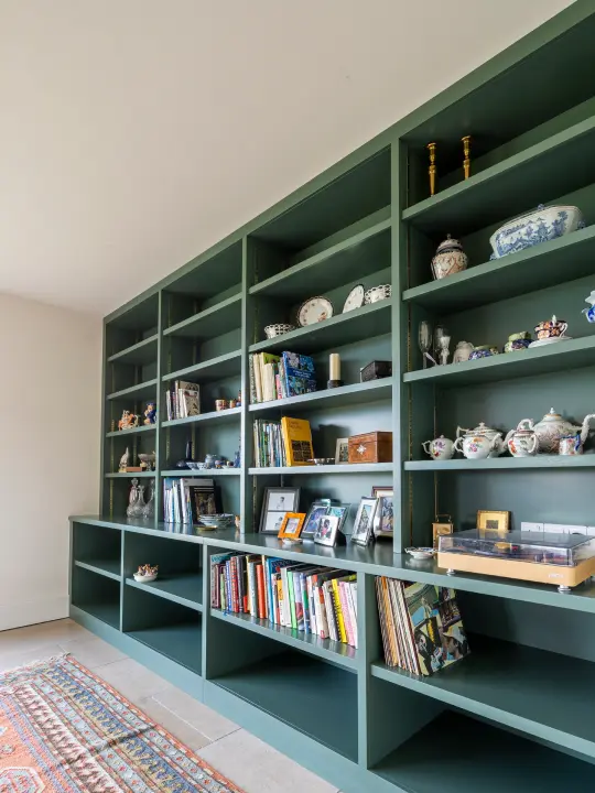 Bespoke fitted furniture including built-in wardrobes and custom shelving units crafted to fit your space